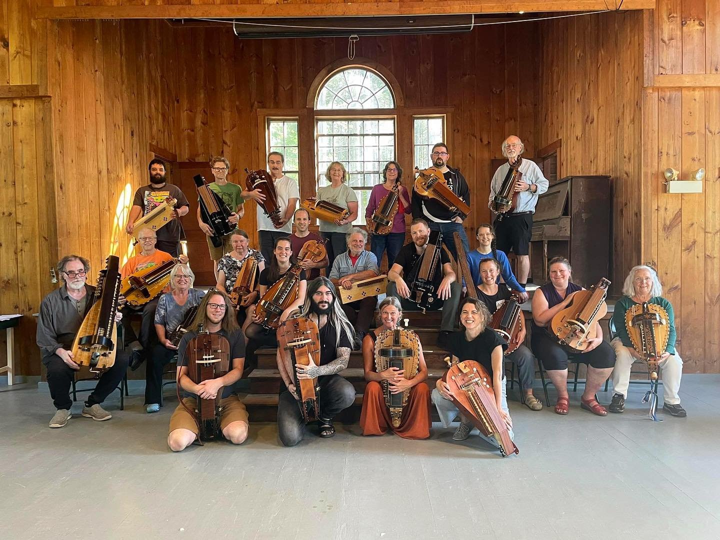 Sergio with a large group of hurdy-gurdy players at a workshop in the United States