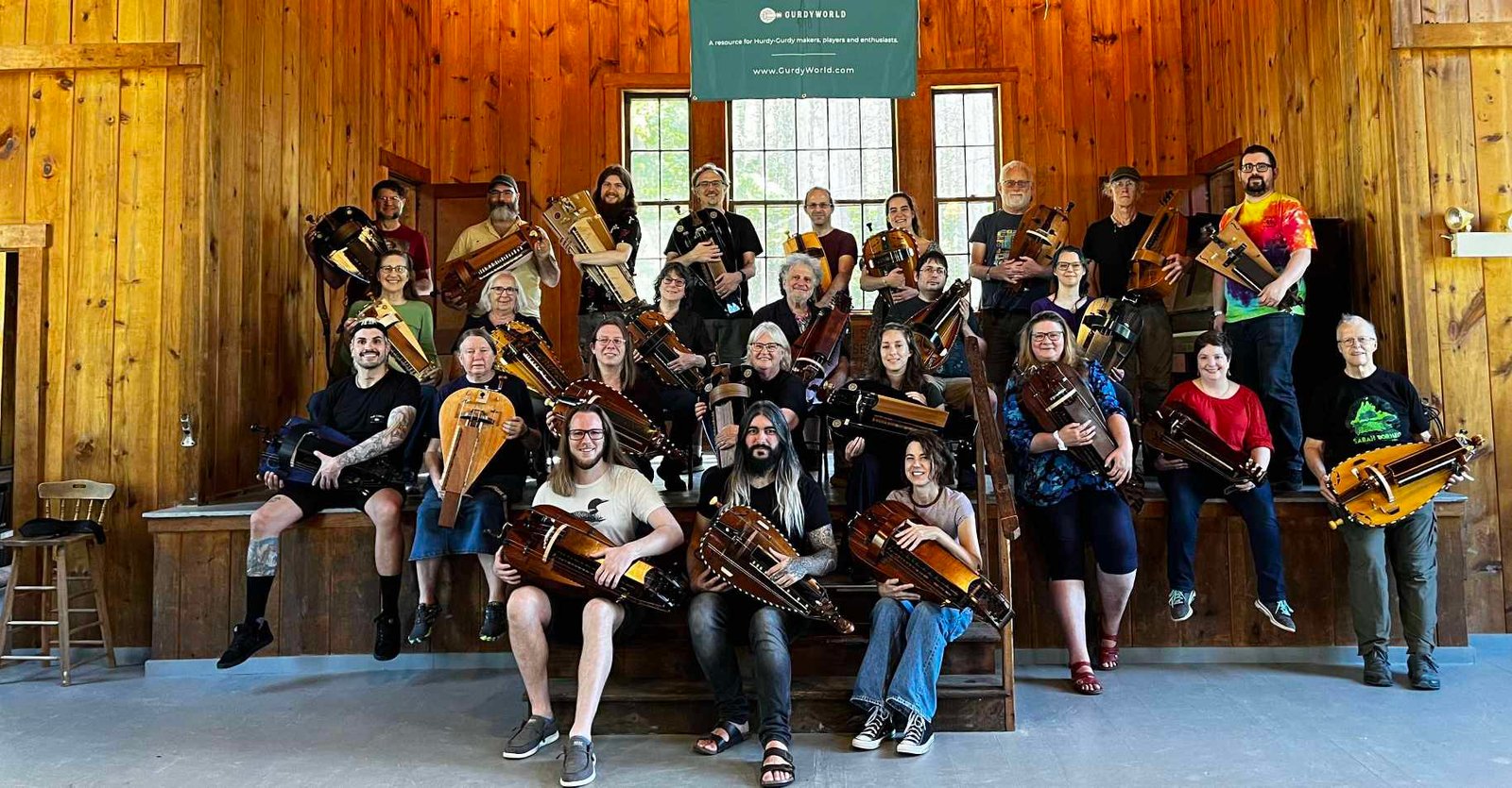 Sergio with hurdy-gurdy players at a United States workshop in 2024